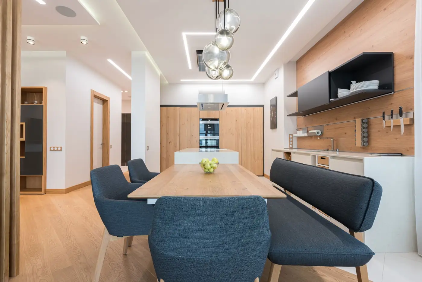 Modern light-wood kitchen and dining area