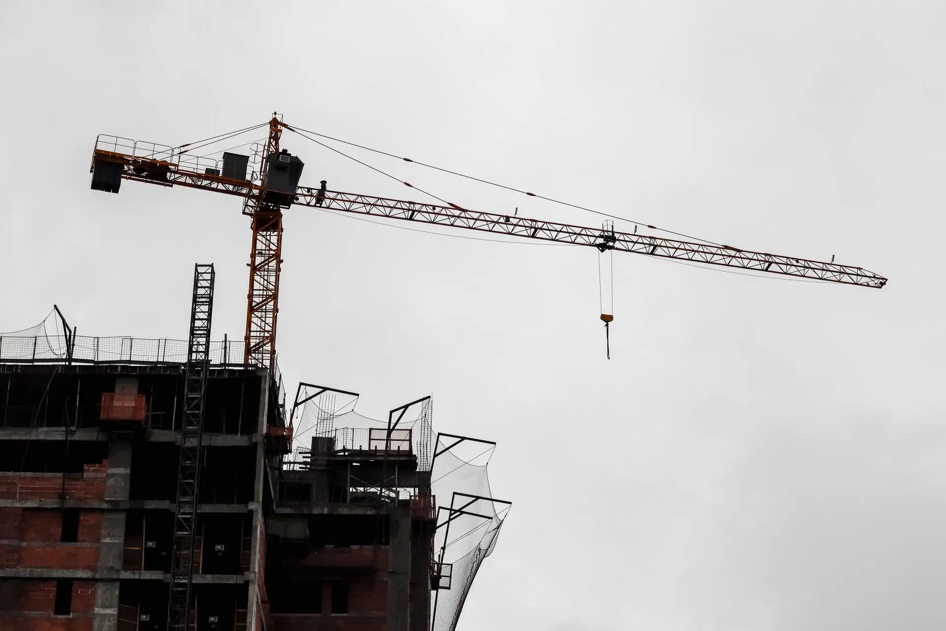 High-rise under construction with tower crane
